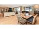 Open-concept living space with hardwood floors, fireplace, and balcony at 333 Massachusetts Ave # 303, Indianapolis, IN 46204