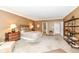 Spacious bedroom with tan walls, carpet floors, and a walk-in closet offers comfort and convenience at 333 Massachusetts Ave # 303, Indianapolis, IN 46204