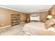 Spacious main bedroom with large windows and seating area at 333 Massachusetts Ave # 303, Indianapolis, IN 46204