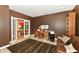 Home office featuring french doors, desk, couch, and decor at 333 Massachusetts Ave # 303, Indianapolis, IN 46204