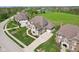Stunning aerial view of the home showcasing its well-manicured lawn and inviting curb appeal at 3384 Homestretch Dr, Carmel, IN 46032