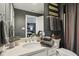En suite bathroom with gray walls, a modern countertop, and attractive decor at 3384 Homestretch Dr, Carmel, IN 46032