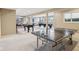 Large recreational room with a ping pong table, foosball table, and a bar area at 3384 Homestretch Dr, Carmel, IN 46032