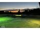 Close-up of hot tub with color-changing lights against a dusk sky at 3384 Homestretch Dr, Carmel, IN 46032
