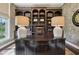 Office with built-in bookshelves and a large desk at 3384 Homestretch Dr, Carmel, IN 46032