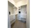 Walk-in closet with adjustable shelving and drawers provides ample storage space at 355 E Ohio St # Ste 105, Indianapolis, IN 46204