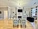 Bright living room boasting hardwood floors, fireplace, and large windows at 355 E Ohio St # Ste 105, Indianapolis, IN 46204