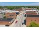 Aerial view of a quiet town street with classic brick buildings and tree-lined streets at 3646 Beach Blvd, Cicero, IN 46034