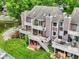 Beautiful backyard featuring multiple decks, a well-kept lawn, and stunning lake views at 3646 Beach Blvd, Cicero, IN 46034