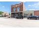 Street view of a brick building with an elegant boutique shop and a well-lit storefront at 3646 Beach Blvd, Cicero, IN 46034