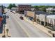 Detailed aerial shot of a town's main street, complete with shops, parking, and a vibrant setting at 3646 Beach Blvd, Cicero, IN 46034