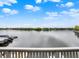 Scenic lake views from a waterfront deck with a glimpse of boats and marina at 3646 Beach Blvd, Cicero, IN 46034