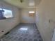 Bedroom featuring natural light and tile flooring at 3755 N Brentwood Ave, Indianapolis, IN 46235