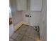 Laundry room featuring tile floors and white walls at 3755 N Brentwood Ave, Indianapolis, IN 46235