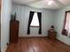 Bedroom with hardwood floors, a ceiling fan, and natural light at 3883 N 150 W, Columbus, IN 47201