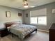 Comfortable bedroom with carpet, neutral walls, and a large window at 4205 Hunt Club Pkwy, Bargersville, IN 46106