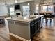 Open concept kitchen with island seating, stainless steel appliances, open to the living and dining rooms at 4205 Hunt Club Pkwy, Bargersville, IN 46106