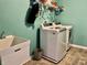 Laundry room with a utility sink, washer and dryer, and metal storage rack at 4205 Hunt Club Pkwy, Bargersville, IN 46106