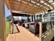 Spacious back patio with wood pergola, table, chairs, grill and outdoor heaters at 4205 Hunt Club Pkwy, Bargersville, IN 46106