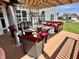 Inviting outdoor patio area complete with heaters, barbecue, and comfortable seating for entertaining at 4205 Hunt Club Pkwy, Bargersville, IN 46106