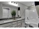 Elegant bathroom with a double sink vanity and a separate toilet and bathtub area at 4249 Brocket Dr, Greenwood, IN 46143