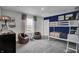 Bright bedroom featuring a bunk bed, two beanbag chairs, and window with view at 4249 Brocket Dr, Greenwood, IN 46143