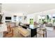 Bright open-concept living and dining area with modern finishes and luxury vinyl flooring at 4302 Persian St, Greenwood, IN 46143