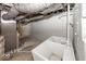 Unfinished basement area with laundry tub and painted walls at 4325 Crittenden Ave, Indianapolis, IN 46205