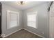 Bedroom with neutral colors, modern light and bright windows at 4325 Crittenden Ave, Indianapolis, IN 46205