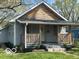 Charming single-Gathering home with a covered front porch and manicured lawn at 4325 Crittenden Ave, Indianapolis, IN 46205