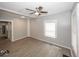 Open-concept living room with hard surface floors and modern fixtures at 4325 Crittenden Ave, Indianapolis, IN 46205