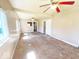 Spacious living room with natural light, ceiling fans, and ready for customization at 4520 Clinton St, Indianapolis, IN 46226