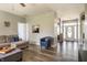 Spacious living room featuring wood floors and a view into the dining and entry areas at 4729 Beach Club Dr, Noblesville, IN 46062