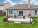 Inviting patio features outdoor seating, a grill, and well-manicured landscaping perfect for entertaining at 4729 Beach Club Dr, Noblesville, IN 46062