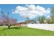 Backyard featuring a verdant, well-maintained lawn and a full white fence at 4905 Candy Spots Dr, Indianapolis, IN 46237