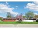 A beautiful brick house sits surrounded by a lush green yard and blooming trees at 4905 Candy Spots Dr, Indianapolis, IN 46237