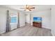 Light-filled bedroom featuring durable flooring, ample natural light, and neutral colors at 4905 Candy Spots Dr, Indianapolis, IN 46237