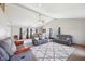 Bright living room with high ceilings, neutral decor, and cozy seating area at 4905 Candy Spots Dr, Indianapolis, IN 46237