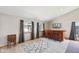 Cozy entertainment area with a wooden bar, natural light, and stylish rug at 4905 Candy Spots Dr, Indianapolis, IN 46237