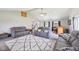 Inviting living room featuring vaulted ceilings, neutral paint, and comfortable seating at 4905 Candy Spots Dr, Indianapolis, IN 46237