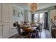 Charming dining room featuring a wooden table, metal chairs, and a bead-style chandelier at 4977 Beechwood Rd, Avon, IN 46123