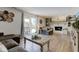 Cozy living room featuring a fireplace, a large sliding glass door, and comfortable seating at 4977 Beechwood Rd, Avon, IN 46123