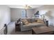 Comfortable living room features a plush sofa and plenty of natural light, creating a welcoming and relaxing atmosphere at 5007 Avian Ln, Indianapolis, IN 46235