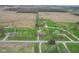 Overhead shot of the house and other neighborhood properties, with farm land surrounding the neighborhood at 5551 W 200 N, Greenfield, IN 46140