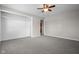 Bright bedroom featuring neutral walls, carpet, and a closet at 5551 W 200 N, Greenfield, IN 46140