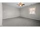 Bright bedroom featuring neutral walls, carpet, and a window at 5551 W 200 N, Greenfield, IN 46140