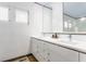 Modern bathroom featuring double vanity sinks, white subway tile, and ample counter space at 5682 Upper Garden Way, Zionsville, IN 46077