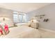 A bedroom with twin beds, white furniture, and a cozy atmosphere at 5682 Upper Garden Way, Zionsville, IN 46077