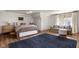 Bedroom featuring hardwood floors and a seating area for relaxing at 5946 N New Jersey St, Indianapolis, IN 46220