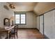 Bedroom has classic wallpaper and a desk that makes a perfect space for homework at 5946 N New Jersey St, Indianapolis, IN 46220